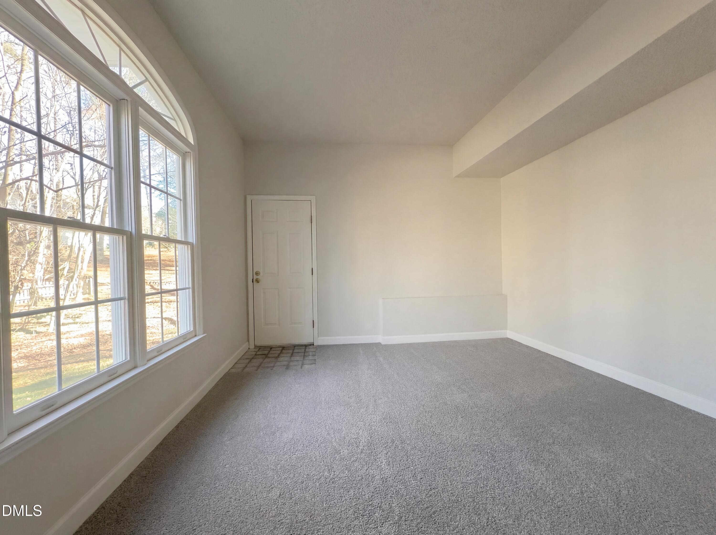 3117 Twatchman Drive Raleigh, NC 27616 - Photo 6 of 27 an empty room with a window