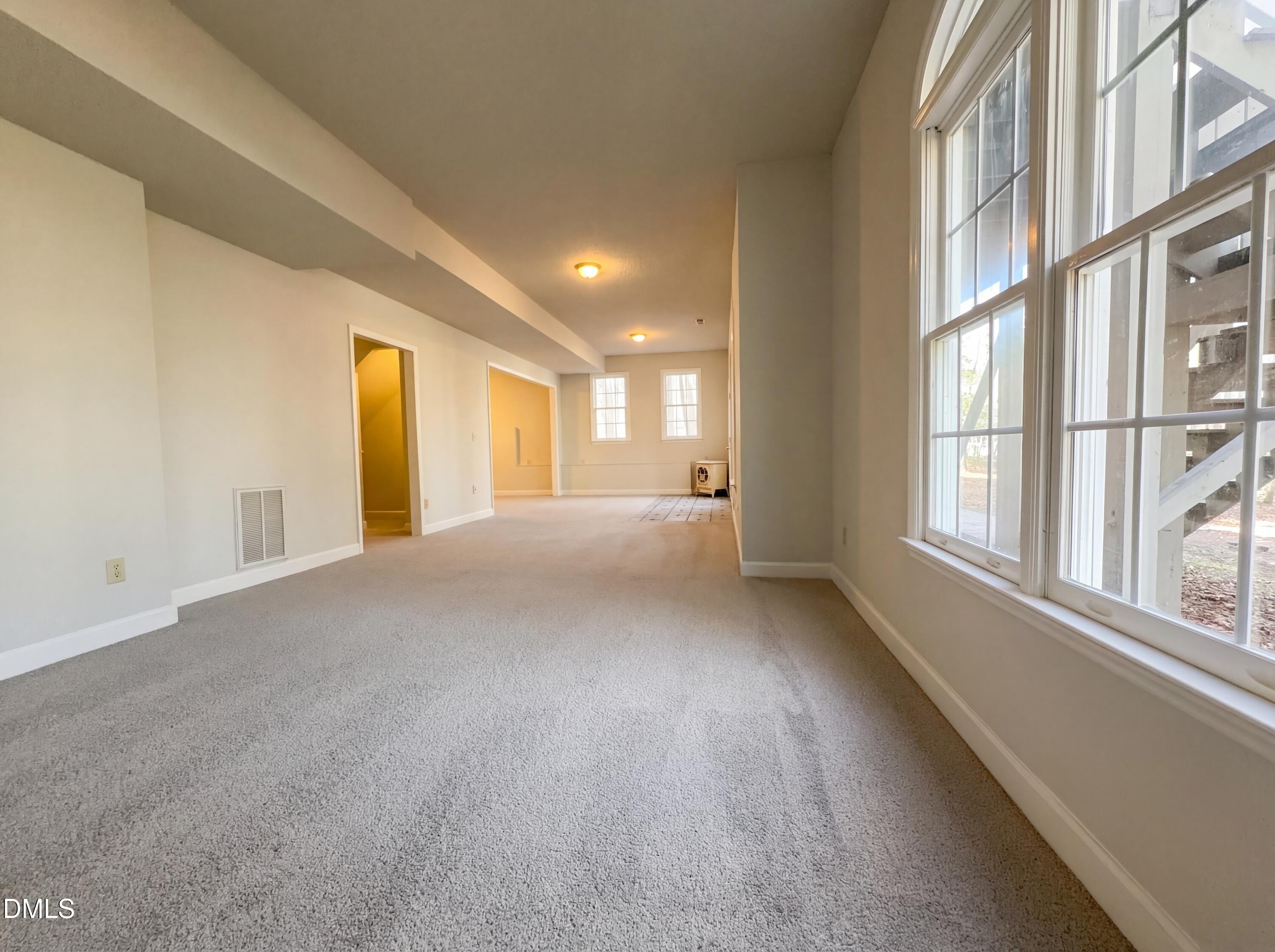3117 Twatchman Drive Raleigh, NC 27616 - Photo 7 of 27 a view of an empty room with a window
