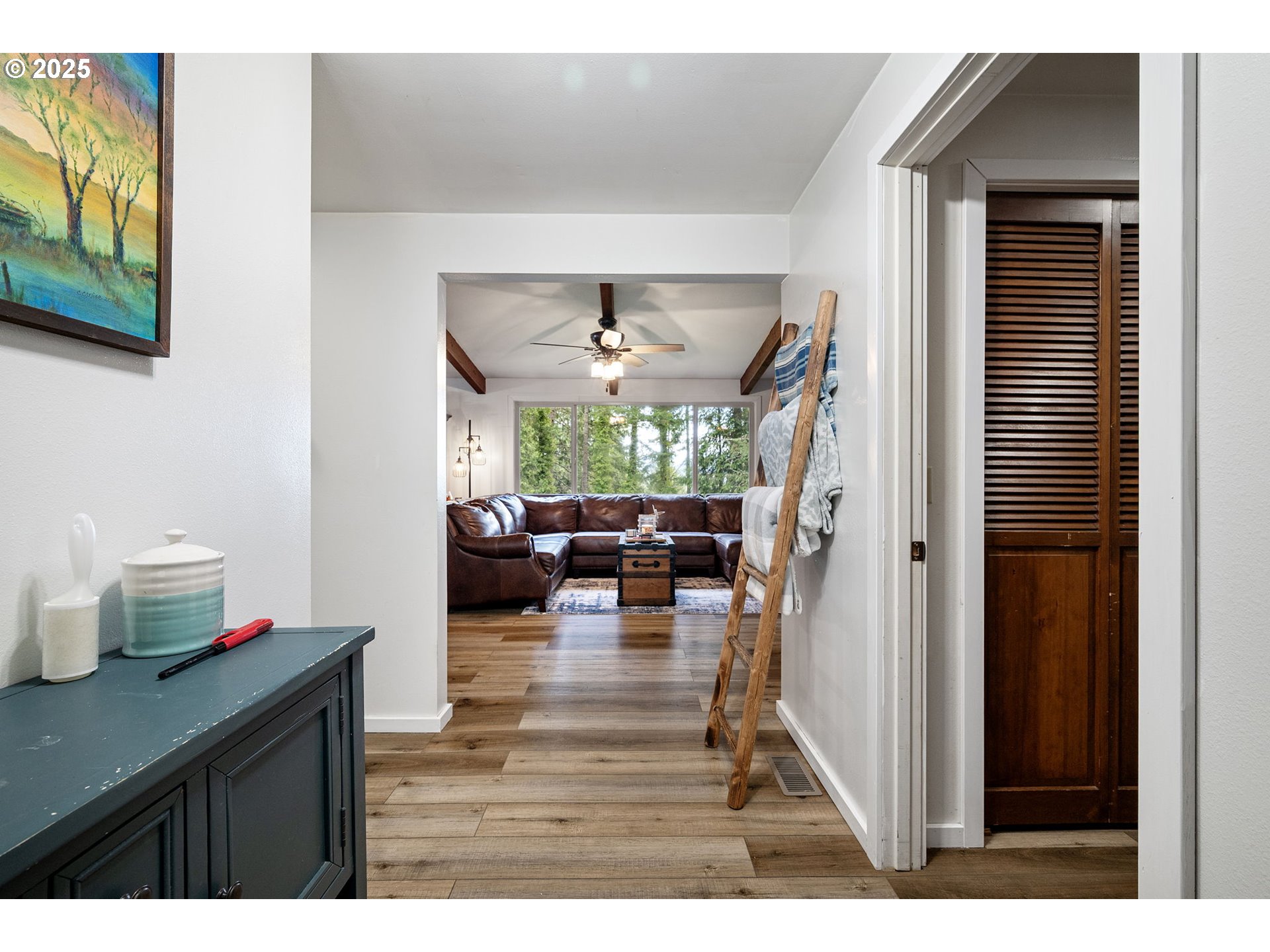 130 Tioga Court Cottage Grove, OR 97424 - Photo 16 of 44 a living room with furniture and a fireplace