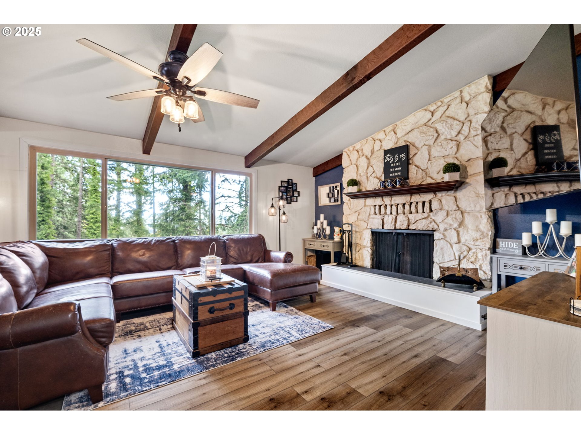 130 Tioga Court Cottage Grove, OR 97424 - Photo 17 of 44 a living room with furniture and a fireplace