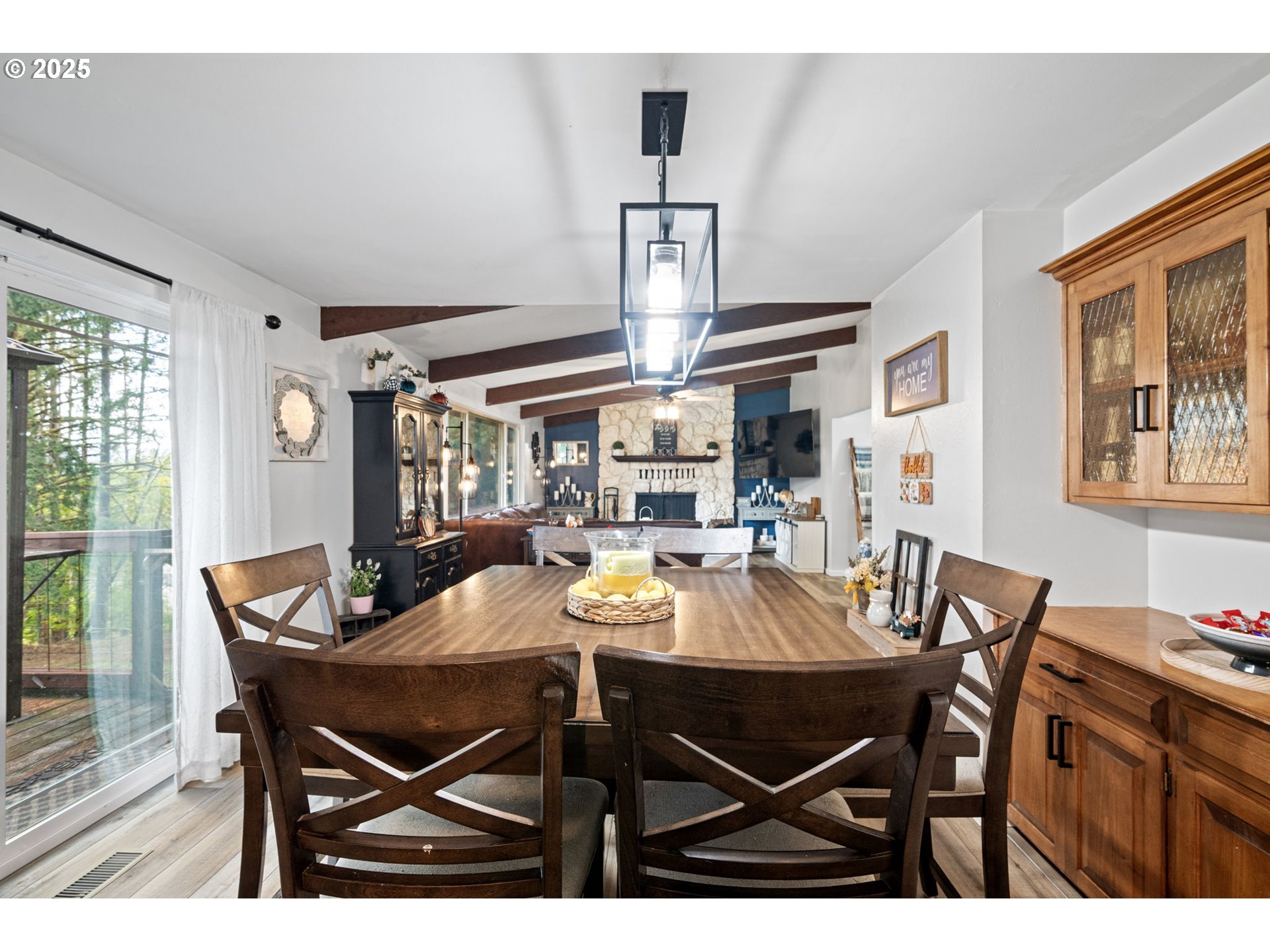 130 Tioga Court Cottage Grove, OR 97424 - Photo 27 of 44 a view of a dining room with furniture and wooden floor
