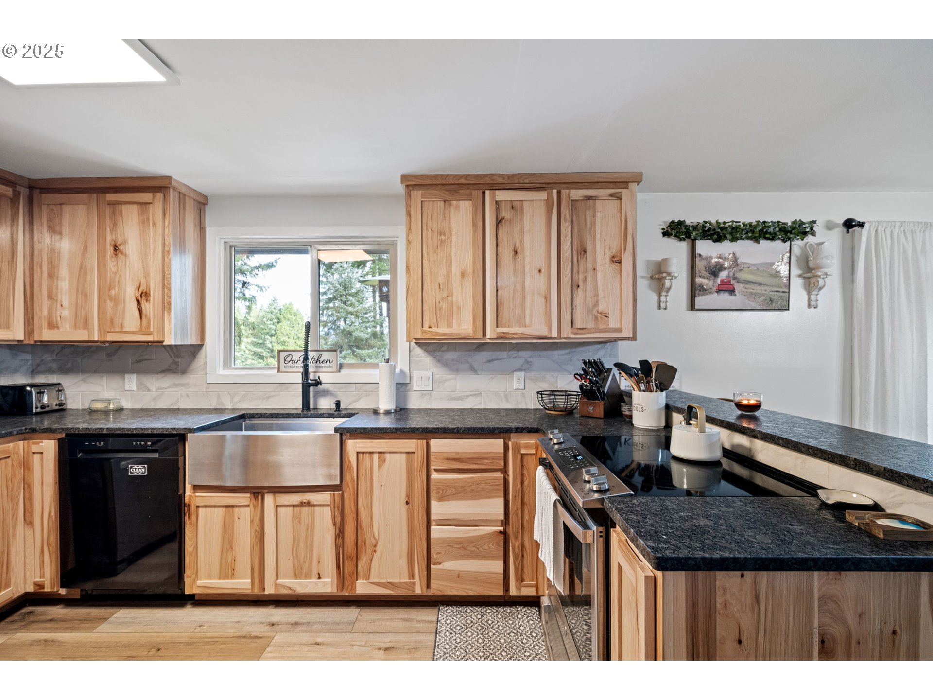 130 Tioga Court Cottage Grove, OR 97424 - Photo 30 of 44 a kitchen with a sink and cabinets