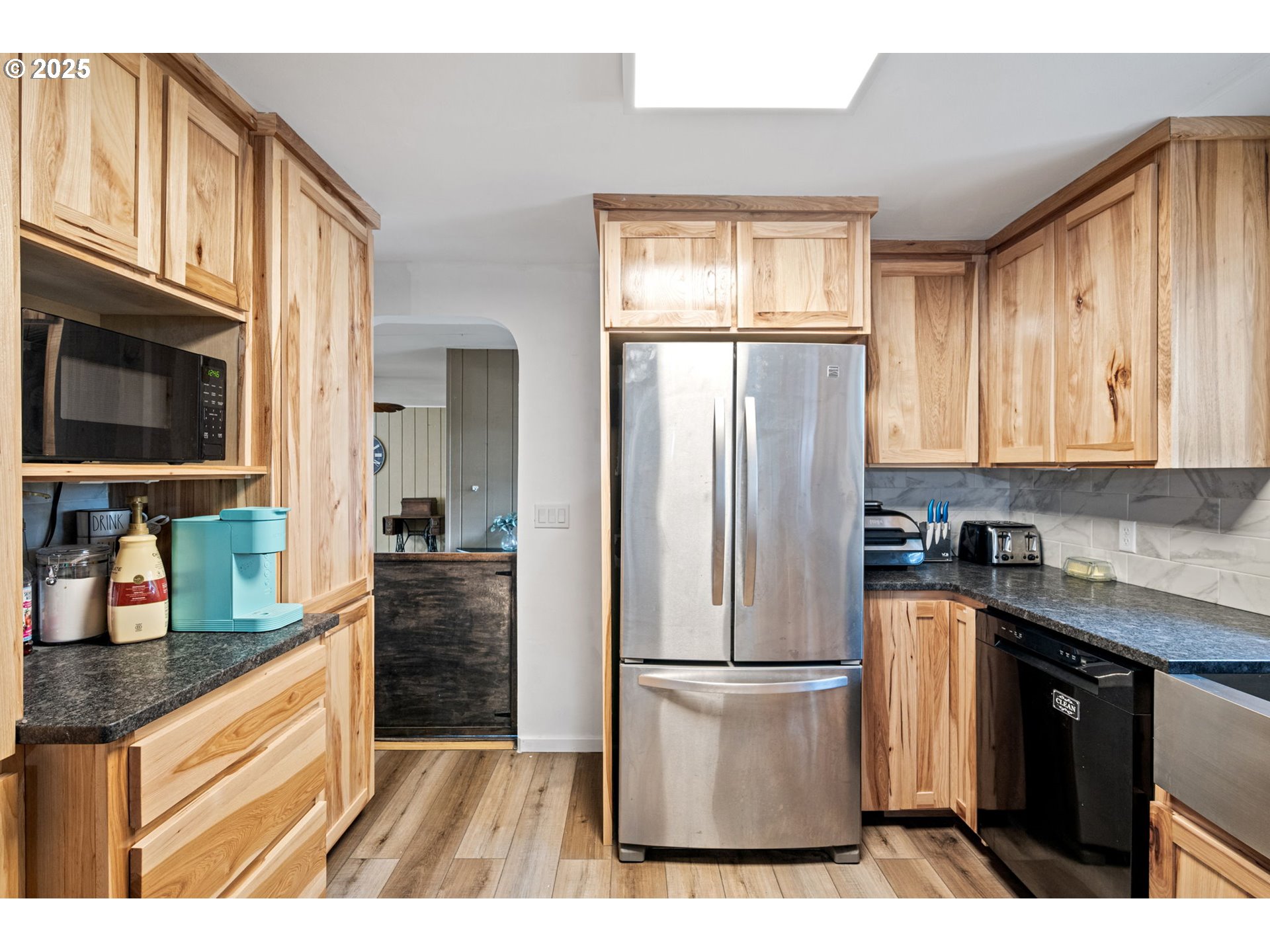 130 Tioga Court Cottage Grove, OR 97424 - Photo 32 of 44 a kitchen with stainless steel appliances granite countertop a refrigerator stove top oven and sink