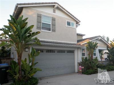 351 Spring Park Road Camarillo, CA 93012 - Photo 3 of 25 a front view of a house with a garage