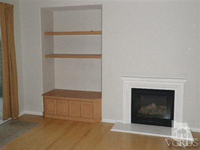 351 Spring Park Road Camarillo, CA 93012 - Photo 7 of 25 a living room with furniture and a fireplace