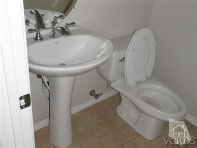 351 Spring Park Road Camarillo, CA 93012 - Photo 10 of 25 a bathroom with a toilet and a sink