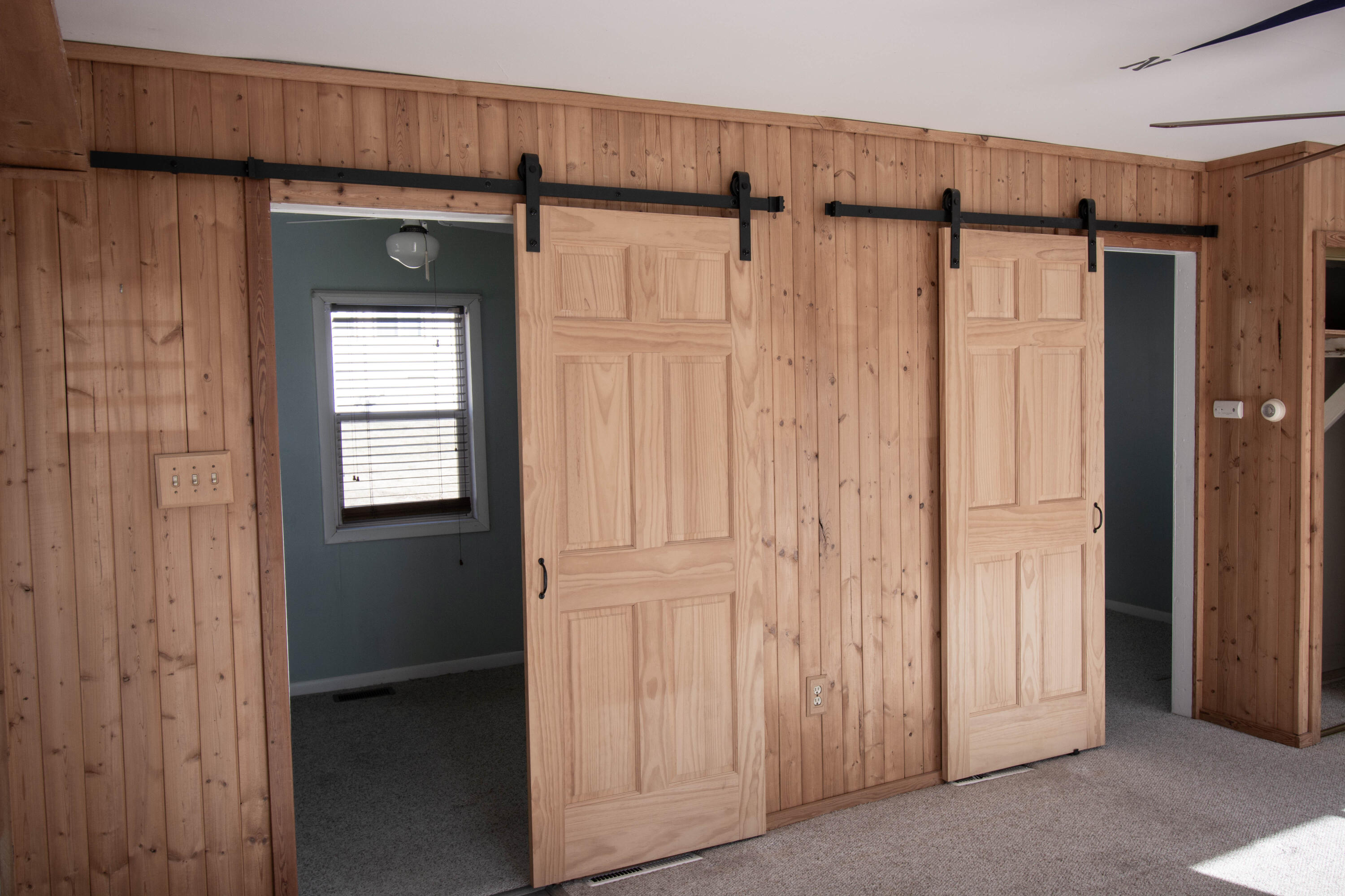 N3220 Acacia Road Geneva, WI 53147 - Photo 19 of 27 Barn Doors to Bedrooms