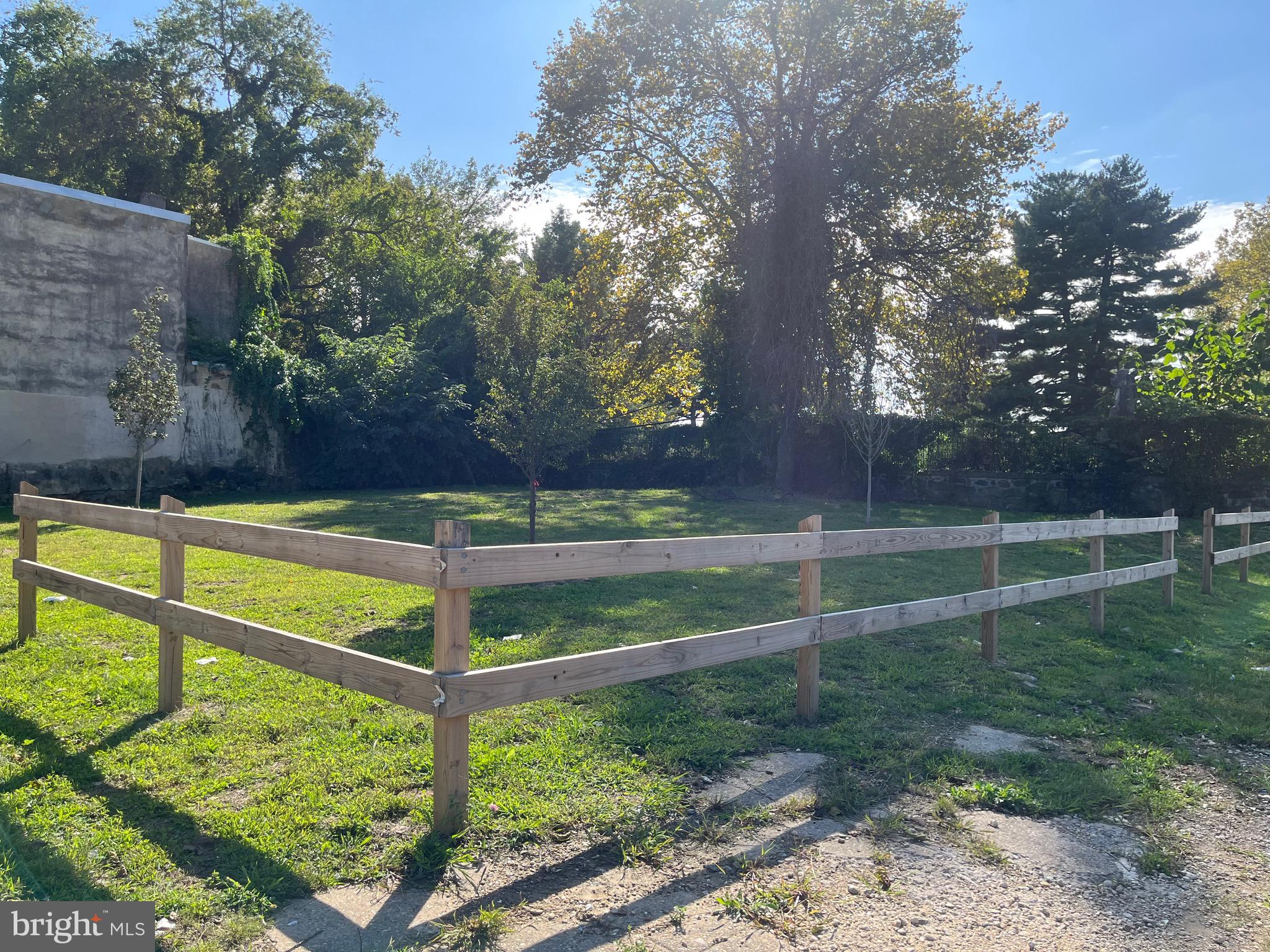 958-60 Farson Street Philadelphia, PA 19131 - Photo 3 of 17 a view of backyard with wooden fence