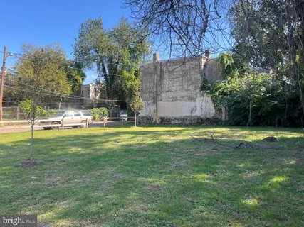 a view of a park with swings and slides