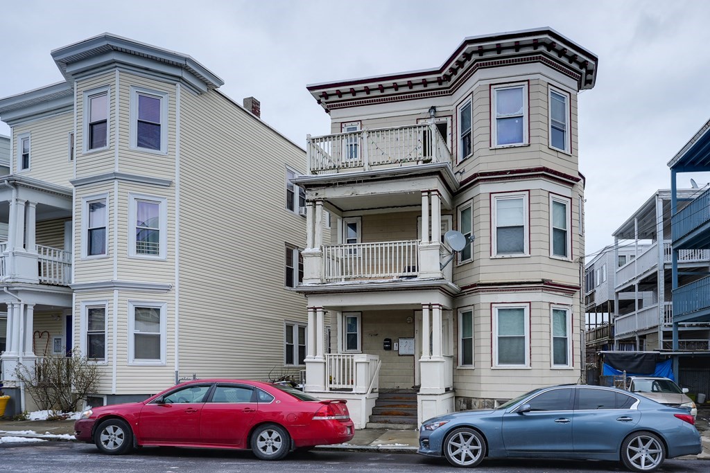 a car parked in front of a house