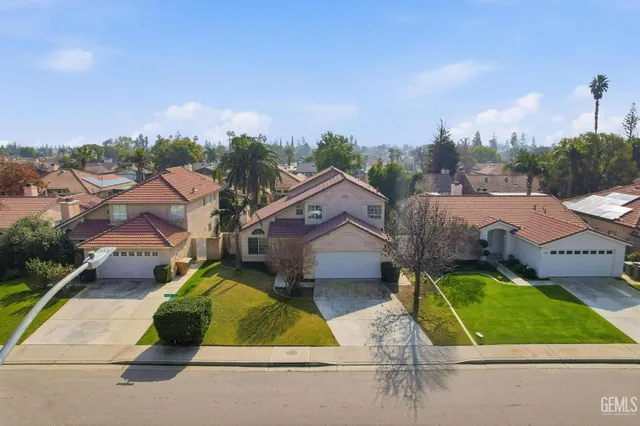 an aerial view of a city with lots of residential buildings