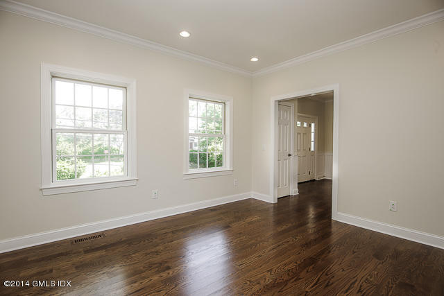 48 Valley Road Cos Cob, CT 06807 - Photo 8 of 33 an empty room with wooden floor and windows