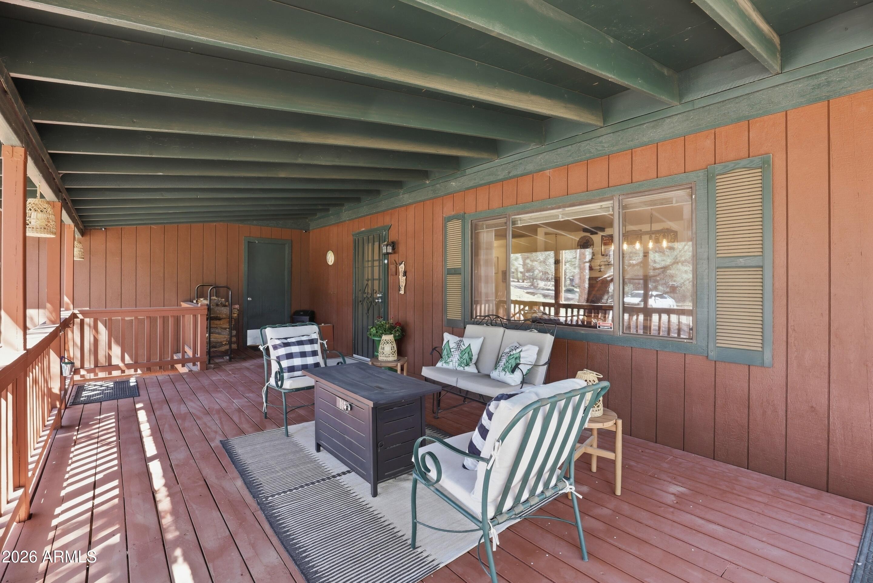 6740 Ridge Road Pine, AZ 85544 - Photo 5 of 35 a view of a patio with wooden floor