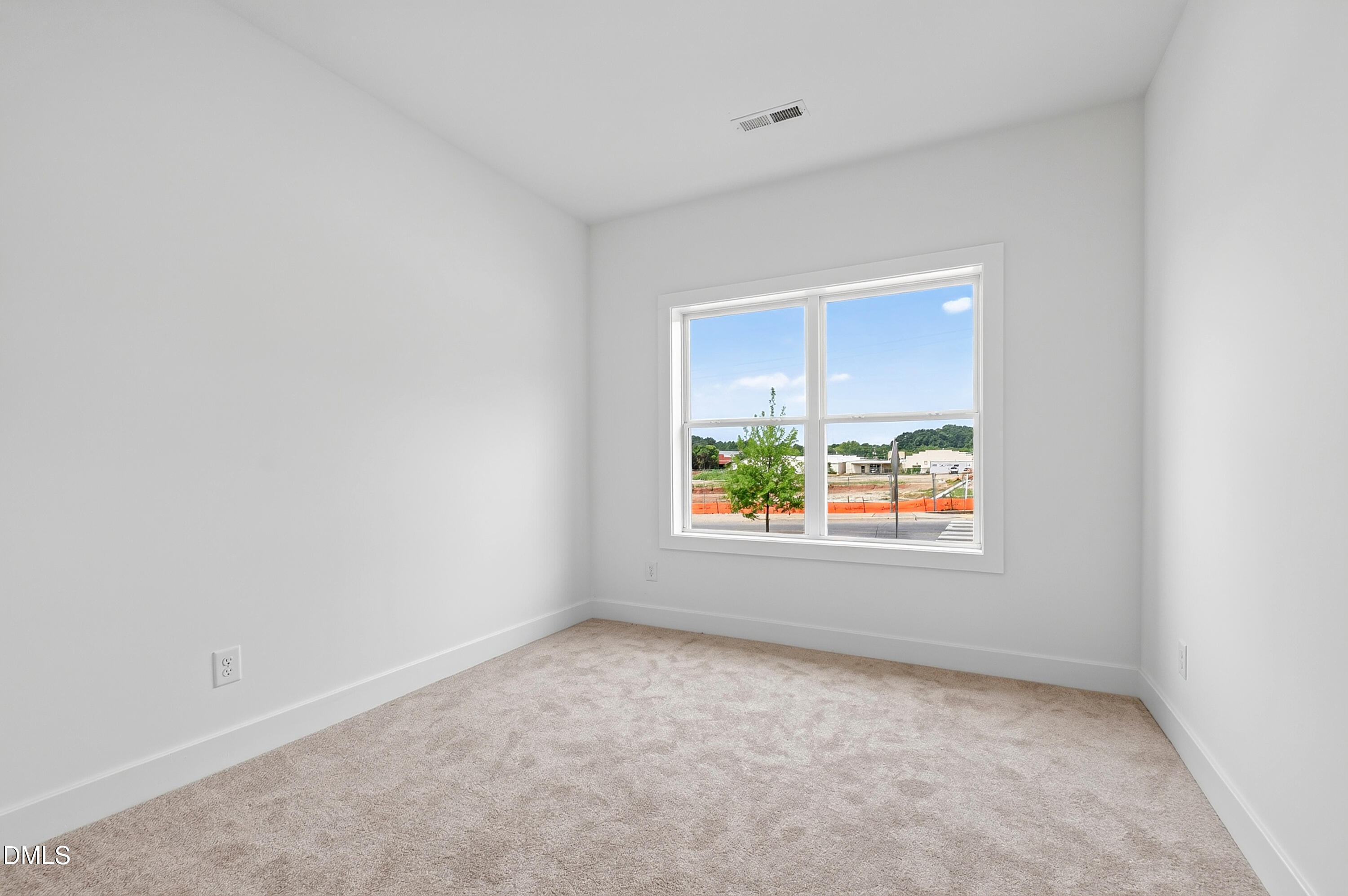 1317 Garner Road, Unit 102 Raleigh, NC 27610 - Photo 10 of 44 an empty room with window and window