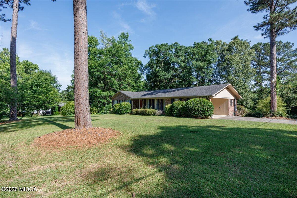 335 Hamrick Road Macon, GA 31220 - Photo 36 of 41 a front view of a house with yard and green space