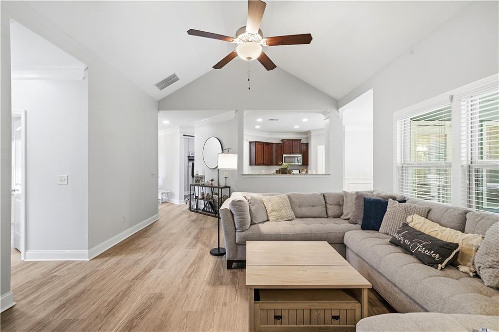 302 Spence Circle Ball Ground, GA 30107 - Photo 11 of 55 a living room with furniture and a large window
