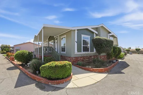 a view of a house with a sink and garden