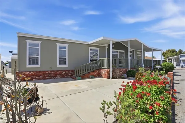 a front view of a house with a porch