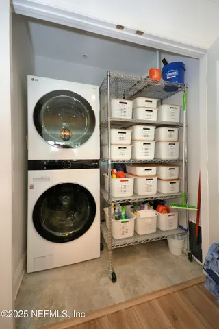 a utility room with storage and utility