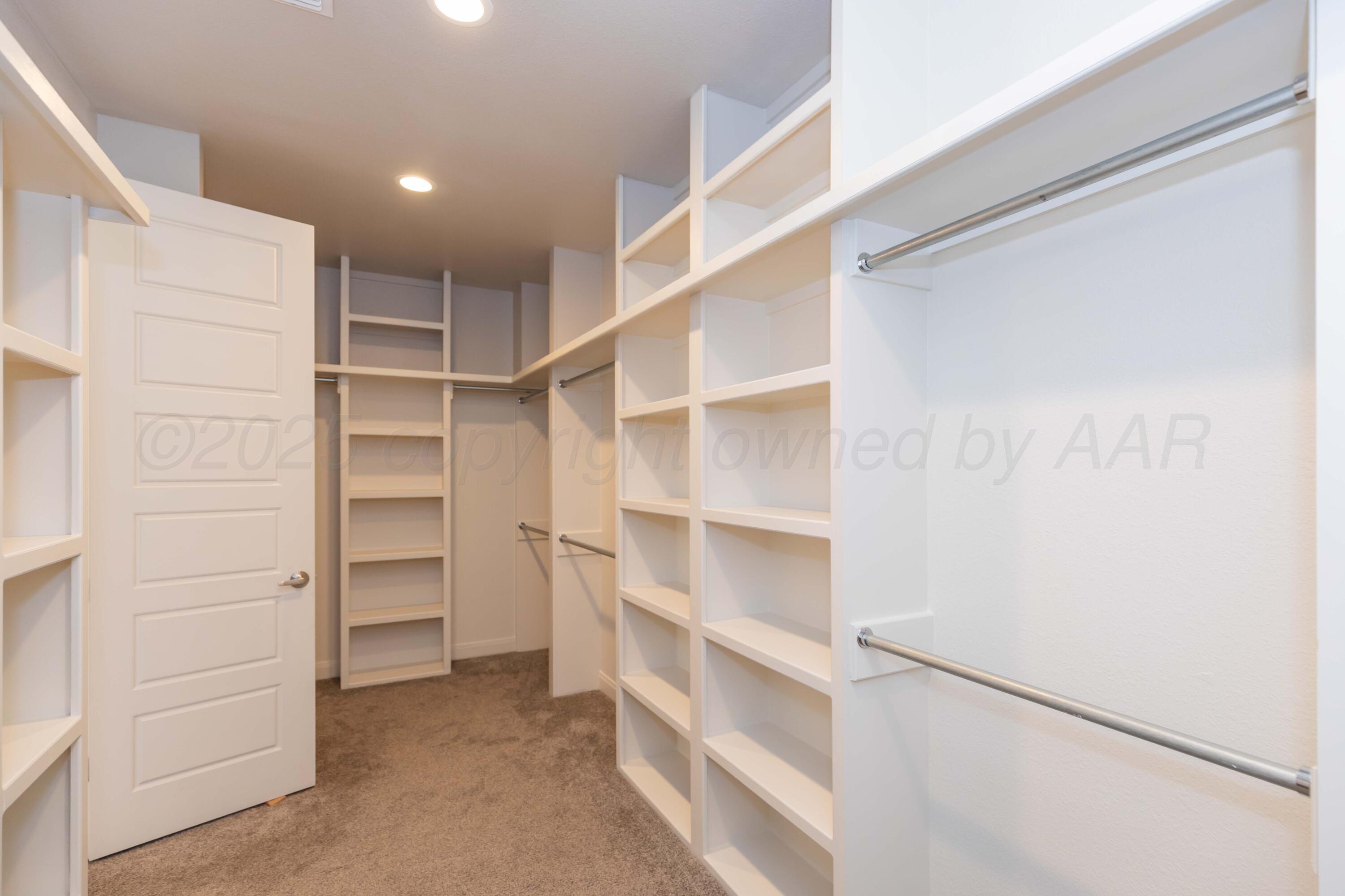 5706 Wesley Road Amarillo, TX 79119 - Photo 28 of 40 PRIMARY CLOSET VIEW 1