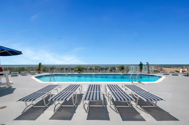 a view of swimming pool with a terrace