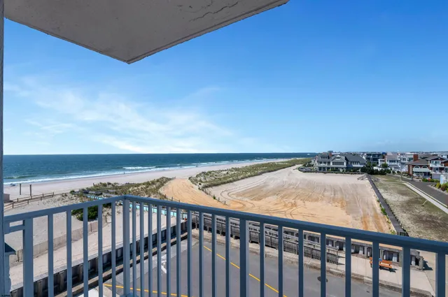 a view of swimming pool with furniture