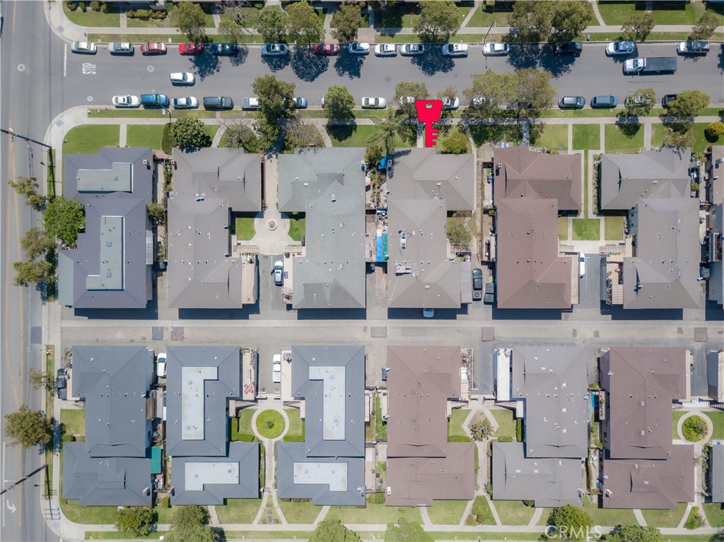 2619 West Orion Avenue Santa Ana, CA 92704 - Photo 6 of 8 a aerial view of multi story residential apartment building with yard