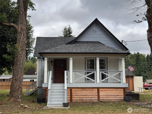 a front view of a house with a porch