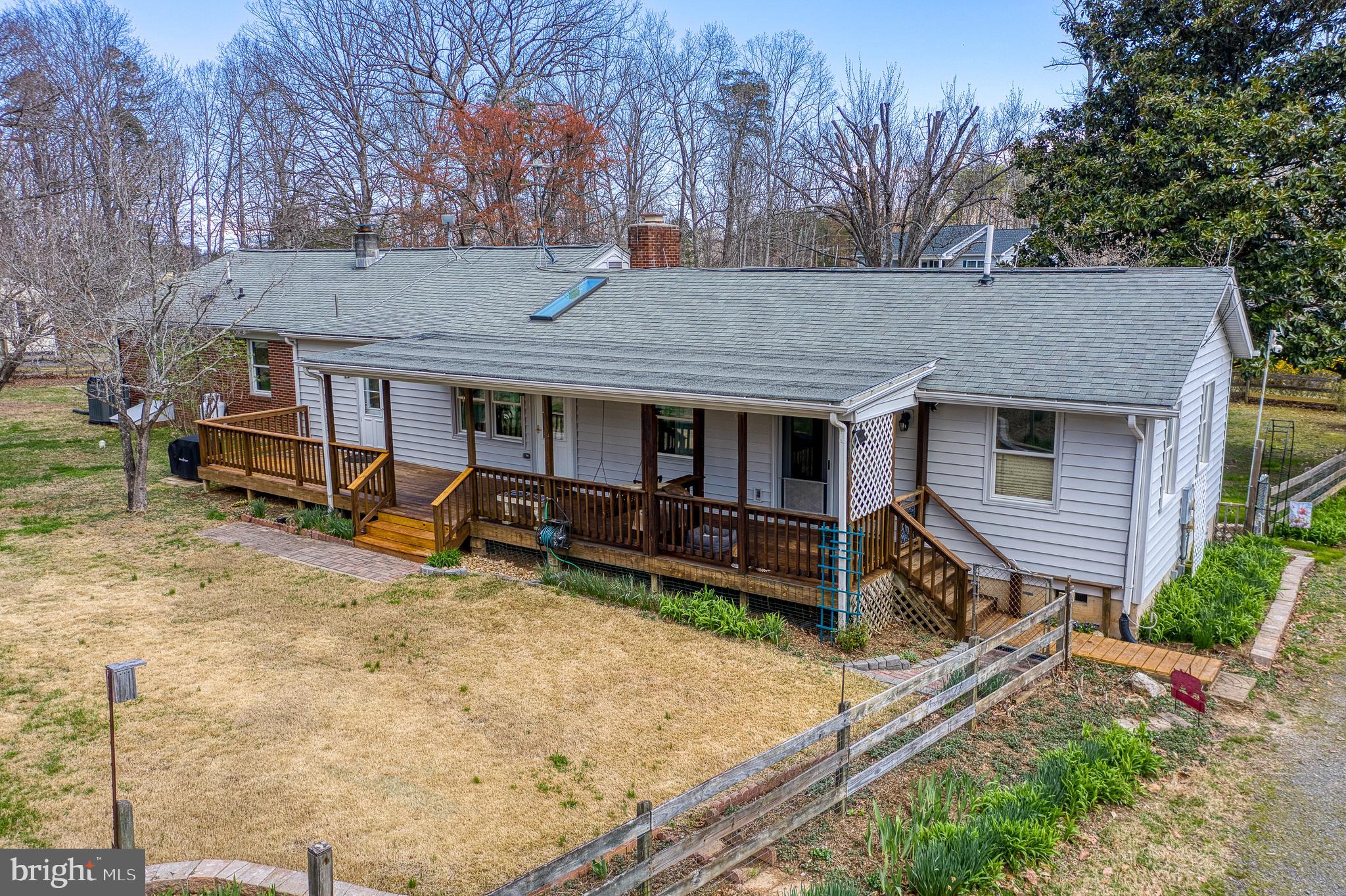 20174 Edwards Shop Road Elkwood, VA 22718 - Photo 1 of 54 front view of a house with chairs and a table
