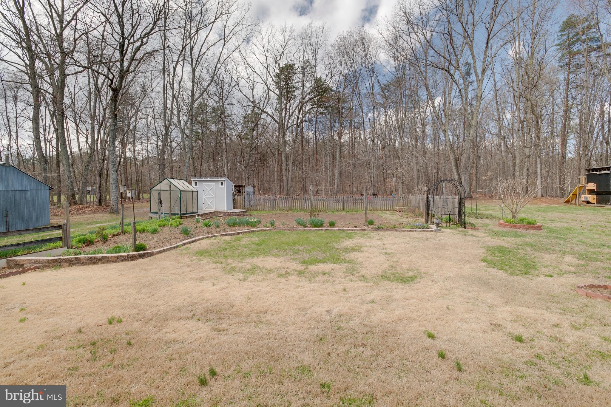 20174 Edwards Shop Road Elkwood, VA 22718 - Photo 28 of 54 a backyard of apartments with large trees
