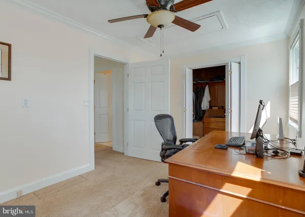a view of outdoor space with playground and green space