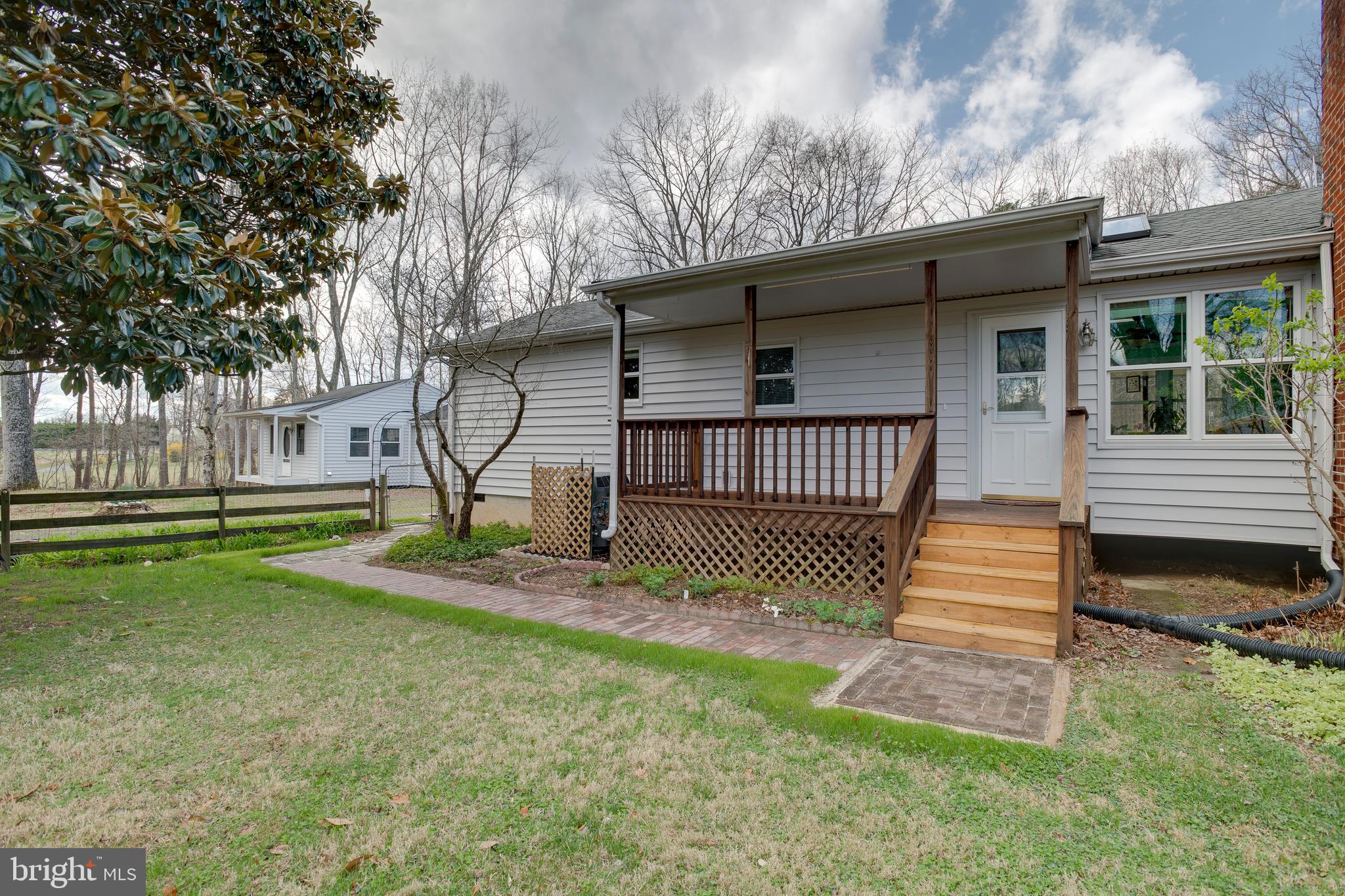 20174 Edwards Shop Road Elkwood, VA 22718 - Photo 3 of 54 a view of a house with a yard and sitting area