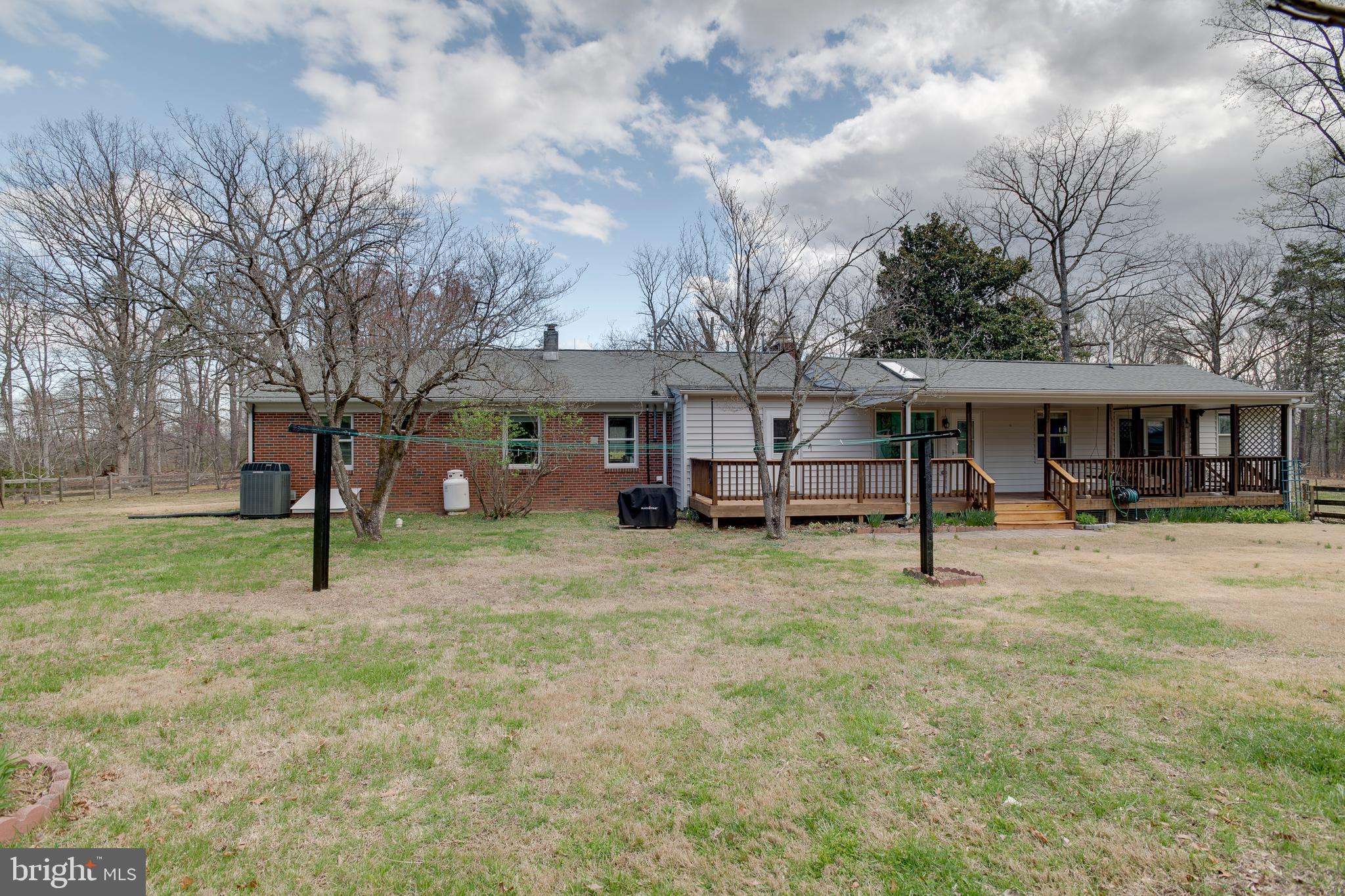 20174 Edwards Shop Road Elkwood, VA 22718 - Photo 8 of 54 a view of a house with a backyard and tree