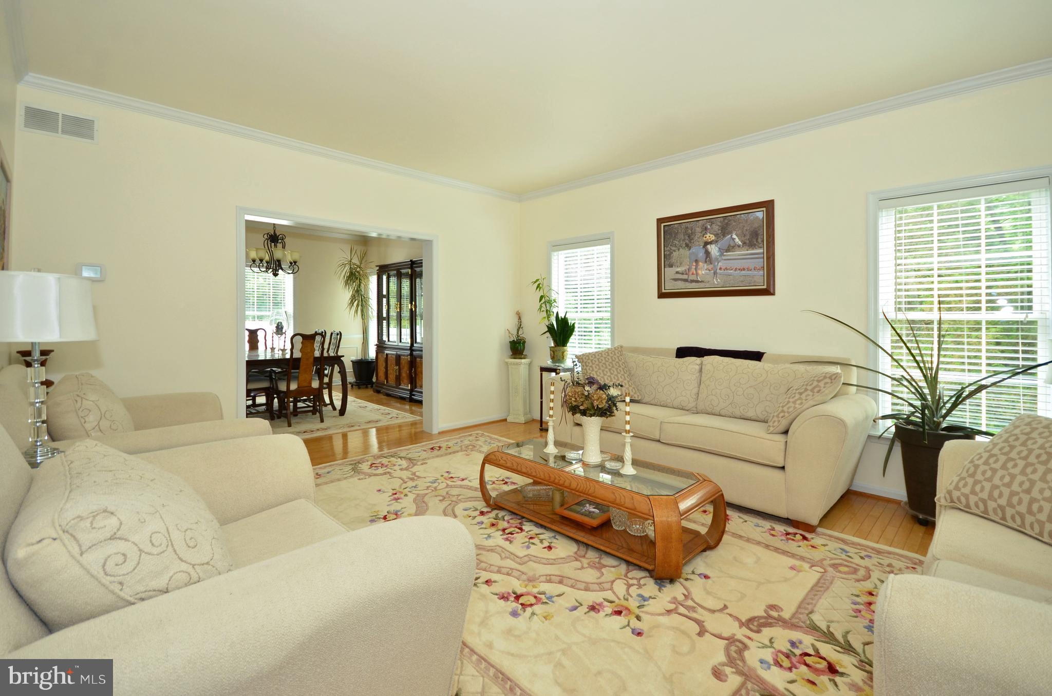 2666 Baldwin Mill Road Baldwin, MD 21013 - Photo 3 of 26 a living room with furniture wooden floor and a large window