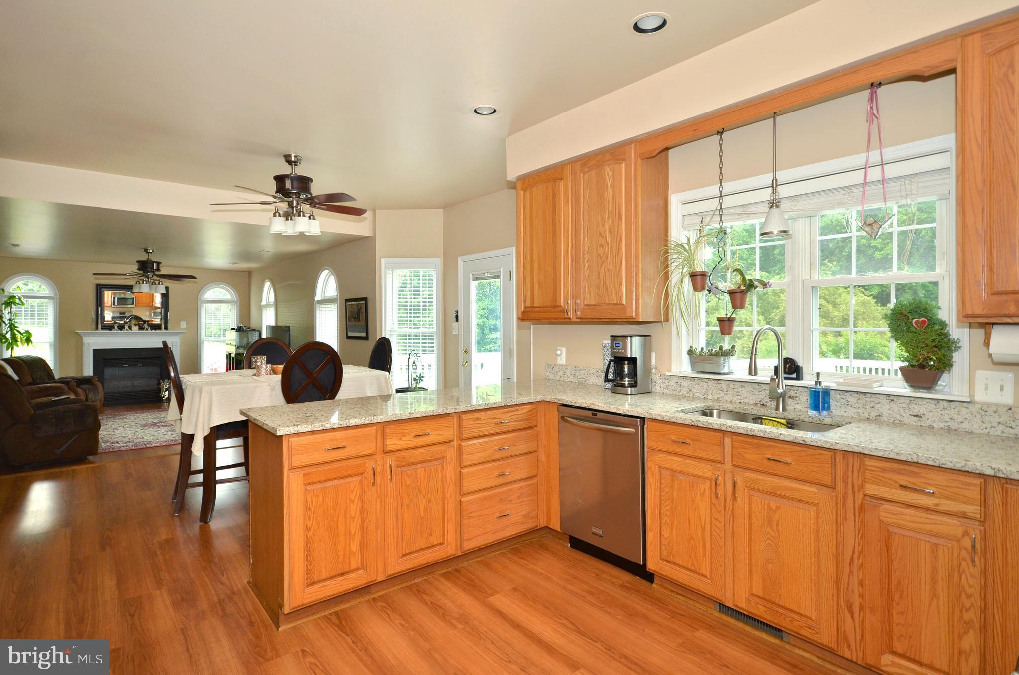 2666 Baldwin Mill Road Baldwin, MD 21013 - Photo 26 of 26 a large kitchen with a large window cabinets and stainless steel appliances