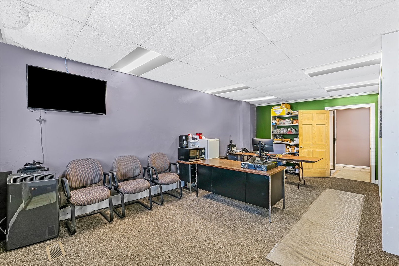 206 West Lincoln Street Saybrook, IL 61770 - Photo 22 of 28 a view of a livingroom with workspace and a couch