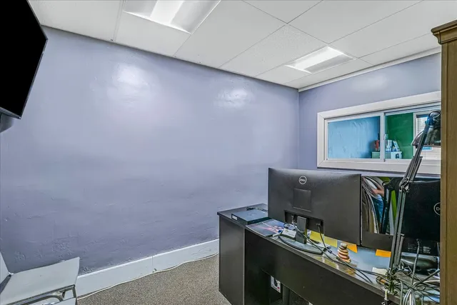 a room with furniture and window