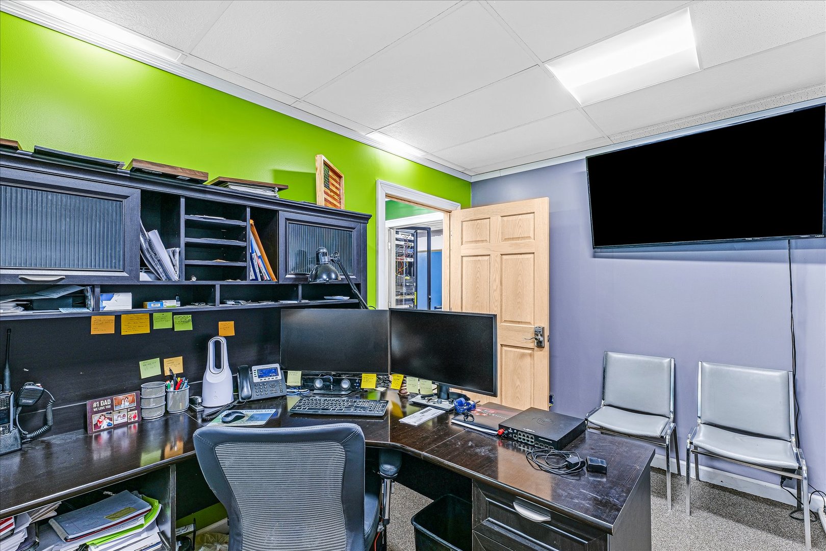 206 West Lincoln Street Saybrook, IL 61770 - Photo 25 of 28 a work room with furniture and a flat screen tv