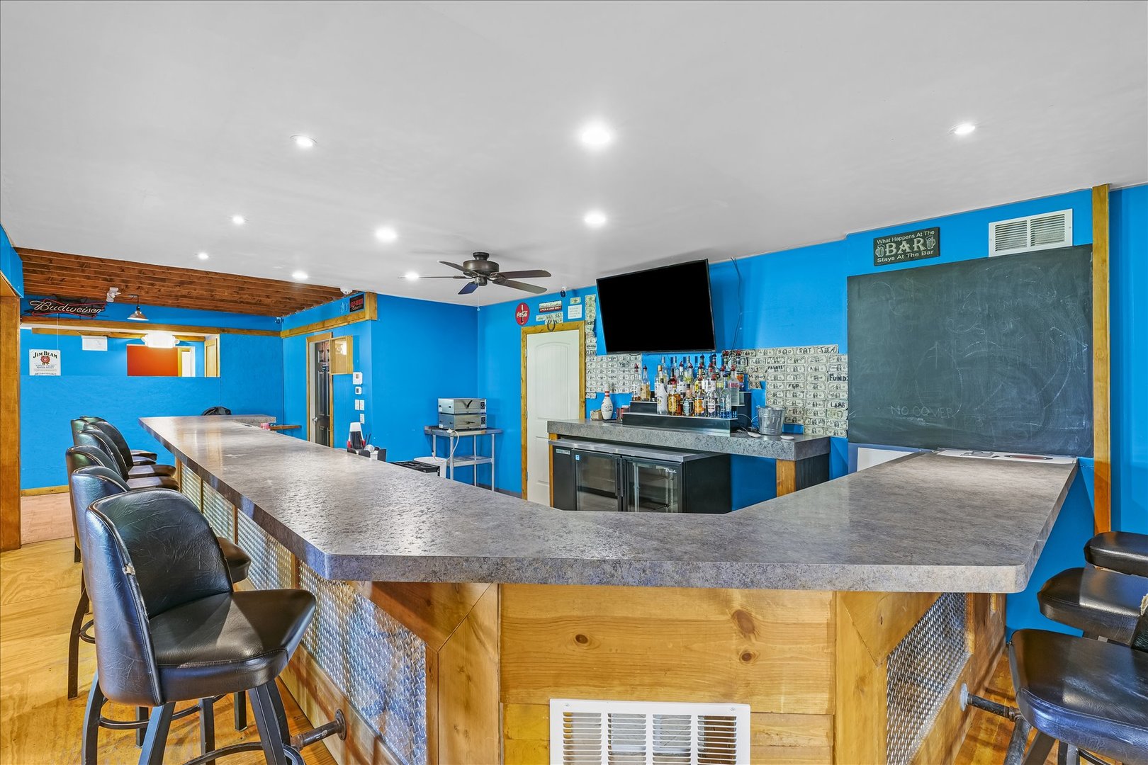 206 West Lincoln Street Saybrook, IL 61770 - Photo 5 of 28 a kitchen with stainless steel appliances kitchen island granite countertop a sink and cabinets