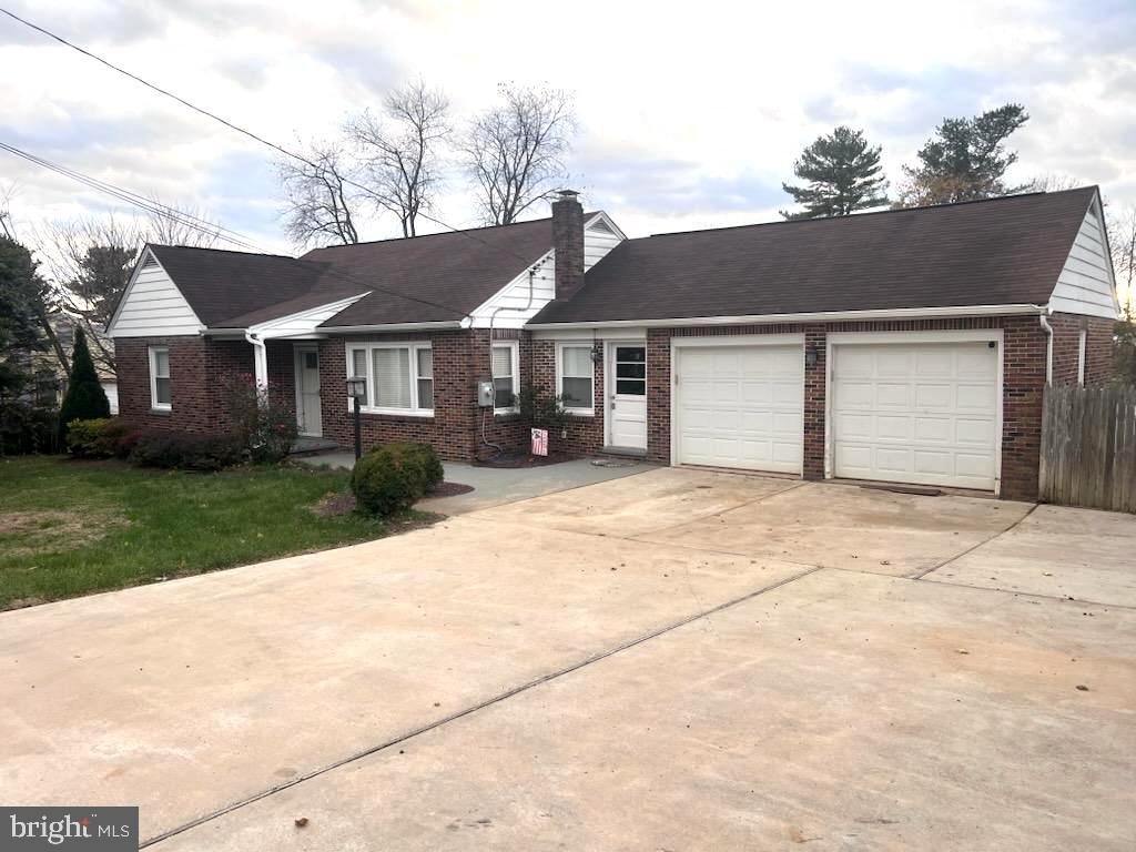 front view of a house and a yard