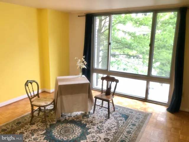 a workspace with furniture and rug