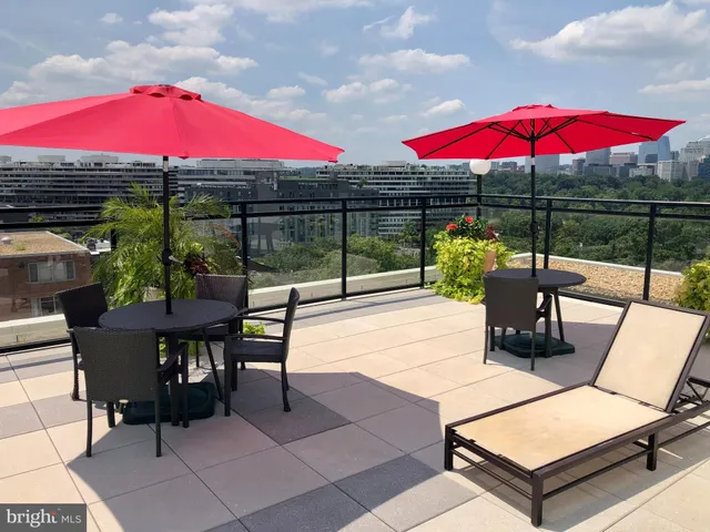 a view of a city with tall buildings