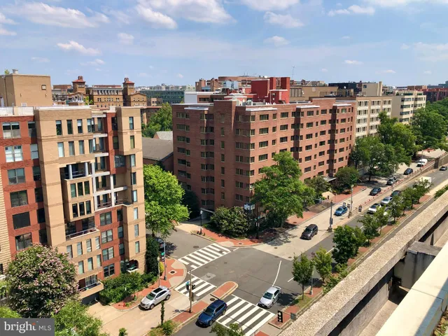 a view of a city with tall buildings