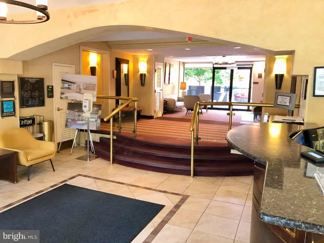 a outdoor space with lots of furniture and lamp