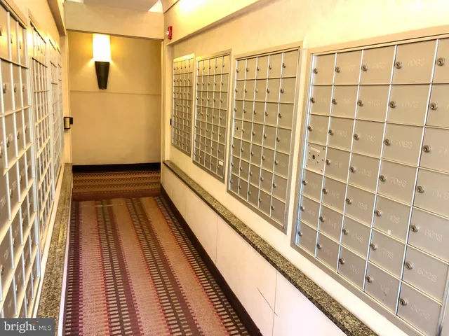 a kitchen with a sink a refrigerator and washer