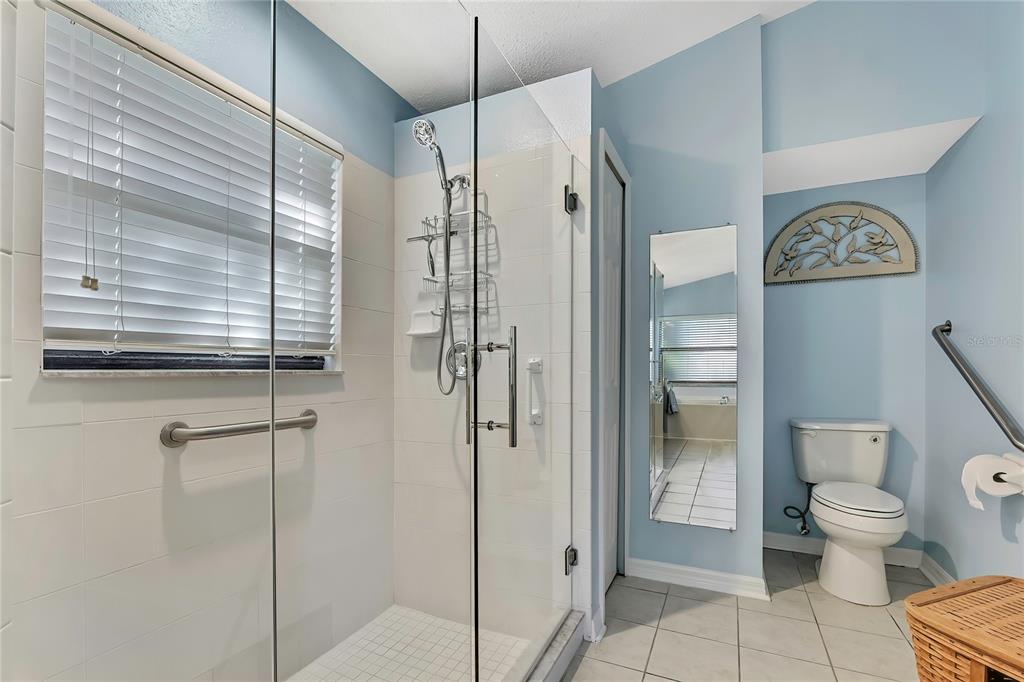 488 Fort Mill Lane Spring Hill, FL 34609 - Photo 21 of 54 a bathroom with a shower and toilet