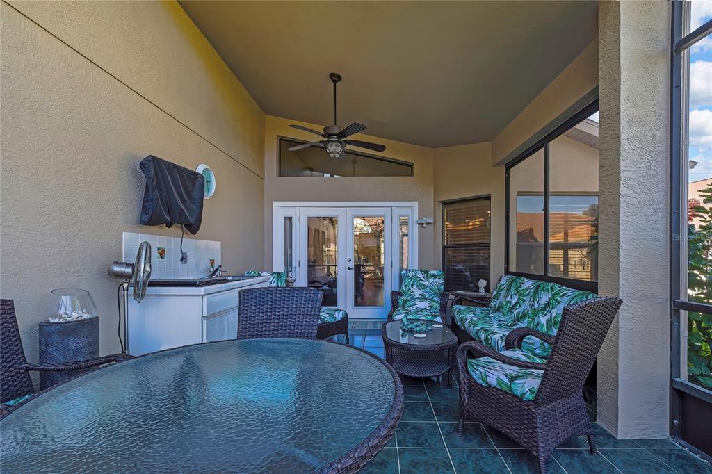 488 Fort Mill Lane Spring Hill, FL 34609 - Photo 32 of 54 a living room with furniture and a large window