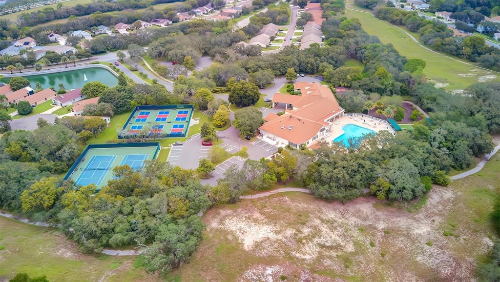 488 Fort Mill Lane Spring Hill, FL 34609 - Photo 53 of 54 an aerial view of a houses with a yard