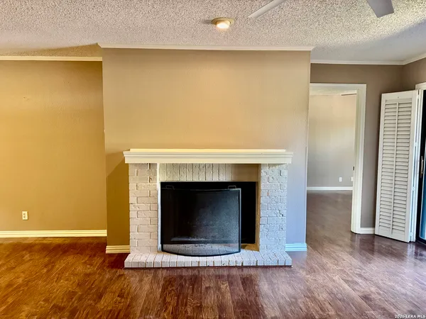 a living room with a fireplace