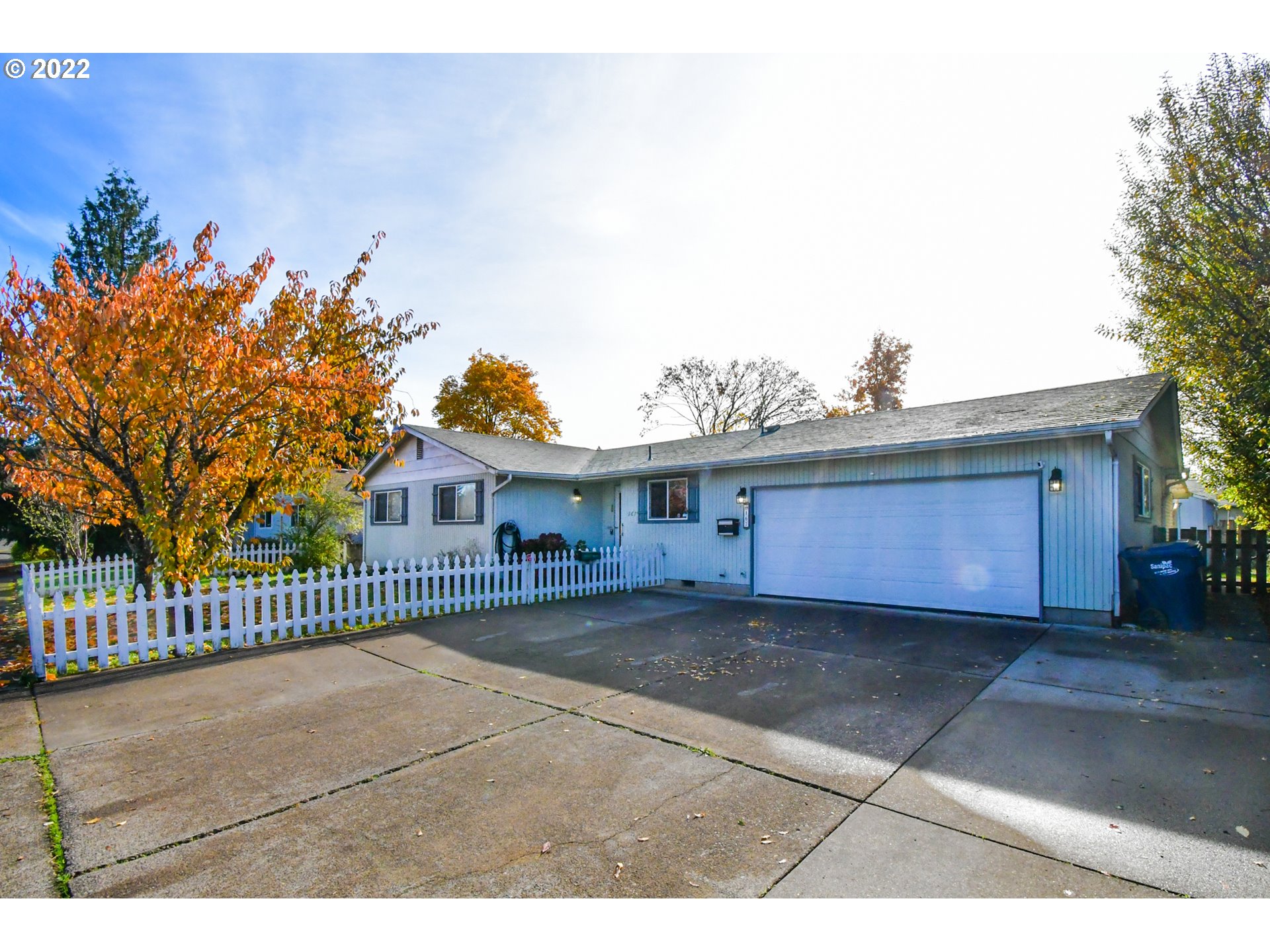 167 V Street Springfield, OR 97477 - Photo 1 of 23 a view of a house with a yard